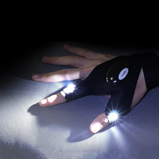 Luva preta com luzes LED nos dedos para leitura e atividades noturnas